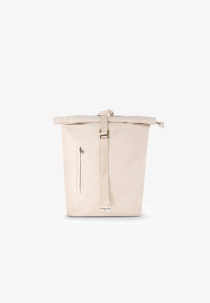 Canvas tote bag in beige, featuring a roll-top closure, adjustable strap, a side zip pocket, and a branded label at the front.