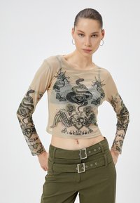 CROP - Bluse - beige