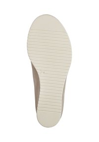 Suela de zapato color beige claro con un patrón de agarre texturizado y área del dedo suave. El material de goma es flexible, con una forma redondeada y un diseño minimalista.