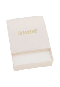Scatola rettangolare bianca con una finitura liscia, caratterizzata dalla parola "amor" in lettere dorate sul coperchio. L'interno è vuoto e di colore beige.