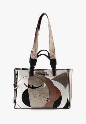 Rechteckige Handtasche mit langen Griffen, abstraktem Gesichtsmotiv in Beige, Braun, Schwarz und Weiß sowie dem "Anekke"-Logo auf der Vorderseite.