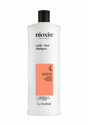 White plastic bottle of Nioxin Pro Clinical Scalp + Hair Shampoo, 1L, with black cap and orange label detailing hair care for colored, dry, damaged hair.