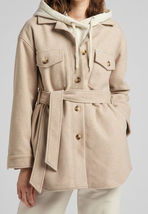 Halflange jas - beige