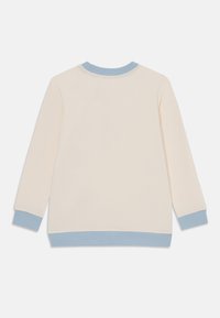 Lys beige sweatshirt med lange ermer. Har en lys blå ribbestrikket rund hals og mansjetter. Glatt tekstur, uformell passform, minimalistisk design.