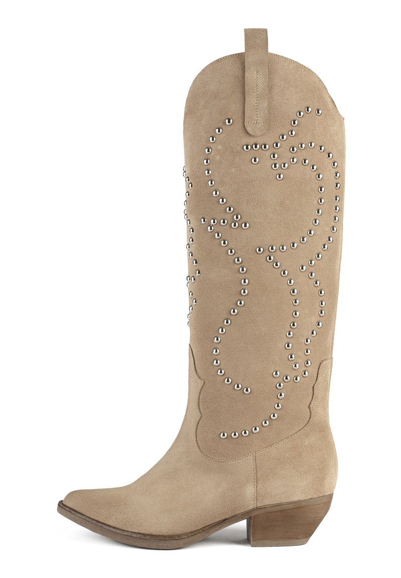 Tan suede knee-high boots with a pointed toe and a stacked heel, featuring decorative silver studs in a swirl pattern along the shaft.