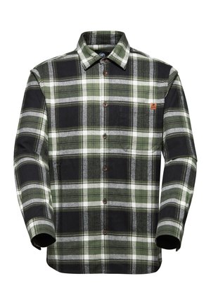 Camicia di flanella a quadri nei colori verde scuro, nero e bianco. Presenta bottoni, un colletto e una tasca sul petto. Textura morbida.