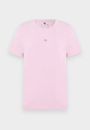 Pink cotton t-shirt with short sleeves, round neckline, and a small logo detail on the chest. Soft texture and simple design.