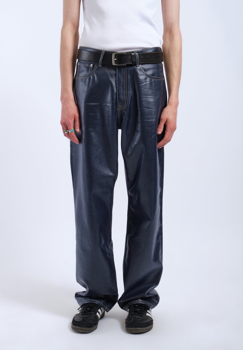 Navy faux leather trousers with a straight leg design, featuring visible stitching, belt loops, and a black belt. Textured finish, casual fit.