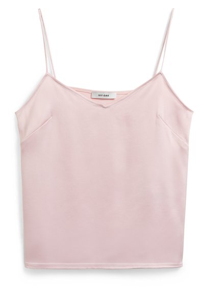 Rosa ermeløs topp med tynne stropper, V-hals, myk tekstur og to side lommer. Merket leser "IVY OAK." Enkel, ren design.