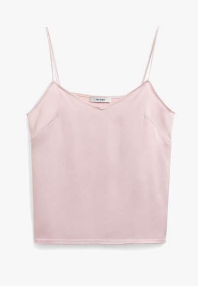 Pink sleeveless top with thin straps, V-neckline, soft texture, and two side pockets. Label reads "IVY OAK." Simple, clean design.