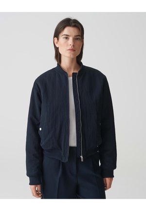 Marine bomberjack met een gewatteerd ontwerp, een rits aan de voorkant, geribbelde mouwen en zijzakken. Soepele textuur, casual pasvorm en minimalistische stijl.