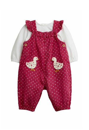 Pink polka dot baby overalls with duck appliques over a white long-sleeve shirt, featuring ruffled shoulder straps and wooden buttons.