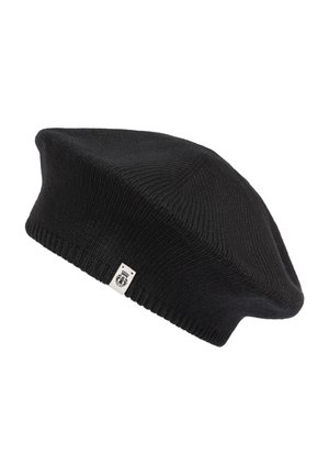 Black knitted beret with a small white tag featuring a black emblem, displayed against a white background.