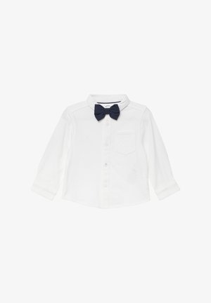 White long-sleeve shirt with a navy bow tie, button closure, and a chest pocket. Cotton material with a smooth texture.