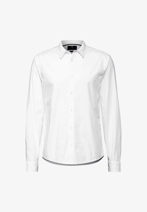 Chemise blanche à manches longues, à boutons sur le devant, avec un col, en coton. Texture lisse avec un ourlet arrondi et un détail de logo ton sur ton.