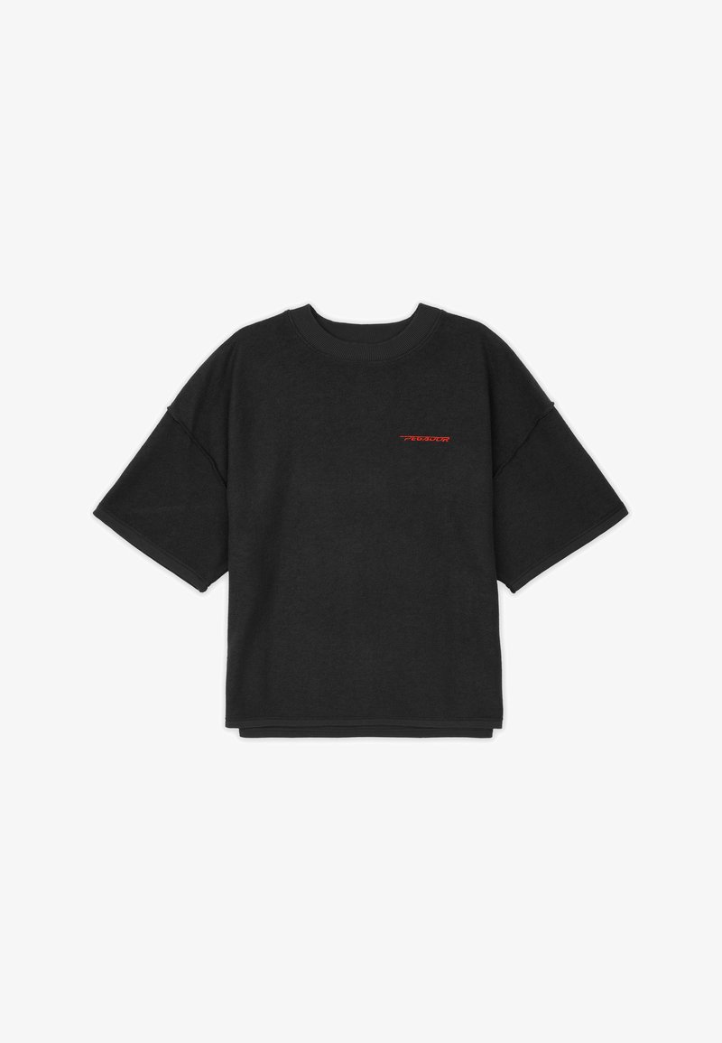 Black oversized t-shirt made of soft cotton, featuring short sleeves, a round neckline, and a contrasting red logo on the front.
