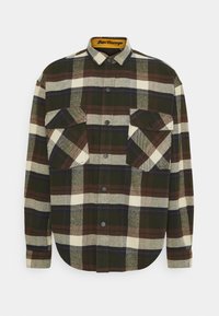 Koszula flanelowa w kratę w odcieniach zieleni, kremu i burgundowego. Posiada zapięcie na guziki z przodu, dwie kieszenie na piersi oraz zaokrąglony dół. Miękka tekstura.