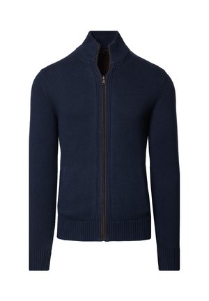 Granatowy kardigan na zamek wykonany z teksturowanej dzianiny, z wysokim kołnierzem, ściągaczami na mankietach oraz dwiema bocznymi kieszeniami z kontrastowym zamkiem.