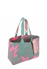 Borsa tote in tela con esterno teal e motivi floreali rosa, manici doppi e una pochette staccabile a pois rosa attaccata al lato.