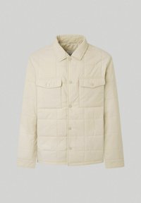 Quilted light beige jacket with a collar, two chest pockets, snap button closure, and textured fabric in a rectangular grid pattern.