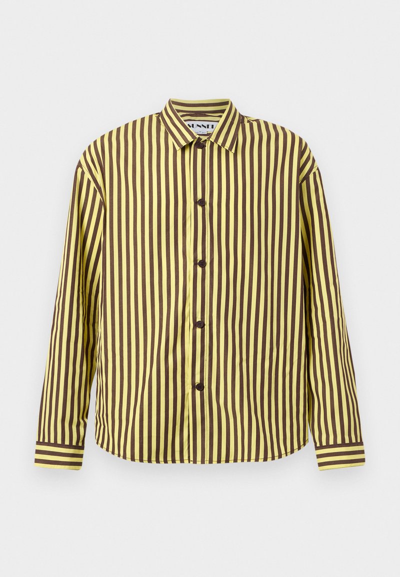 Long-sleeve shirt in yellow and brown vertical stripes, featuring a pointed collar, front buttons, and striped cuffs. Smooth fabric texture.