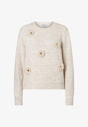 Beige knitted sweater featuring textured floral appliqués and gold accents on the front. Crew neck and ribbed cuffs. Soft material.
