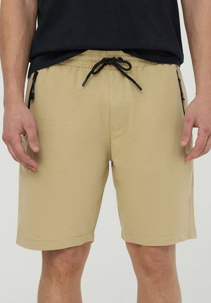 Terranova, Pantaloni sportivi - sabbia