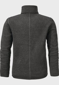 Schwarze, strukturierte Jacke mit hohem Kragen, langen Ärmeln und einer geraden Rückennaht. Das Material zeigt ein gewebtes Muster.