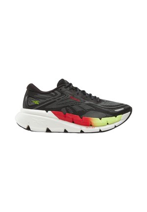 Schwarzer Laufschuh mit weißer Sohle, mit roten und gelben Farbverlauf-Akzenten auf der Zwischensohle und strukturiertem Mesh-Obermaterial, gebrandet mit Reebok-Logos.