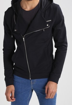 Tröja med dragkedja - black