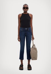 Sportmax SCHERMO - Pieguloša piegriezuma džinsi - blu notte