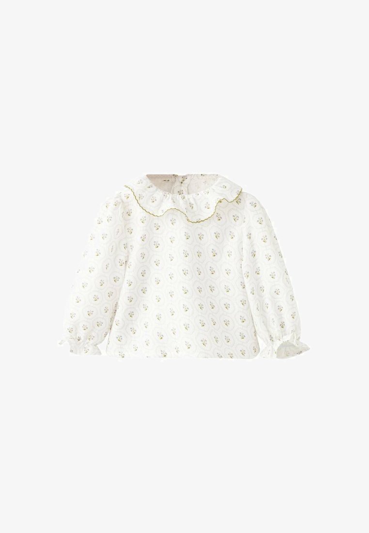 White long-sleeve shirt with a Peter Pan collar, featuring a floral pattern and ruffled cuffs, detailed with a thin green outline.