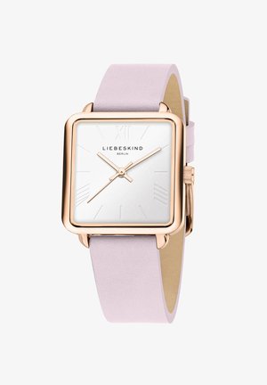Montre carrée avec un boîtier en acier inoxydable rose gold, un cadran blanc et un bracelet en cuir rose clair. Possède des index horaires minimalistes et un logo.