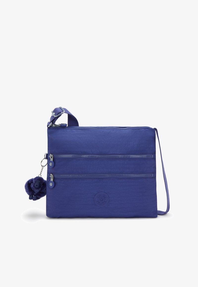 Borsa in nylon viola con due tasche con zip, tracolla e portachiavi con pompon. Presenta un logo rotondo impresso sul davanti.