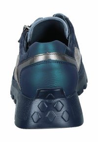 Navy blue sneaker with suede and leather material, metallic accents, textured sole, padded collar, and a zipper on the side.