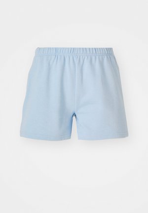Light blue cotton shorts with an elastic waistband. Features a simple, smooth texture and finishes at mid-thigh length. No pockets.