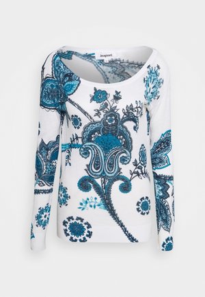 Pull blanc à manches longues avec des motifs floraux en teal et marine sur le devant. Encolure ronde, texture douce et coupe ajustée.