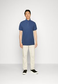 Tommy Hilfiger REGULAR - Poloshirt - blue coast