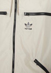 adidas Originals CLASSICS - Windbreaker - beige