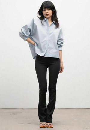 ELIN - Trousers - black