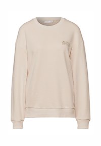 Sudadera de color beige claro con mangas largas, puños y dobladillo acanalados, que presenta un pequeño logotipo de texto bordado en el pecho. Textura de tela suave.