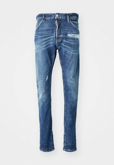 Blue denim jeans with a distressed design. Features fading, light whiskering, and a small tear on the left thigh. Straight-leg cut.