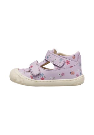 Scarpa per bambini lilla chiaro con motivi floreali e coccinelle, due cinturini in Velcro e suola e puntale in gomma bianca testurizzata.