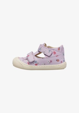 Scarpa per bambini lilla chiaro con motivi floreali e coccinelle, due cinturini in Velcro e suola e puntale in gomma bianca testurizzata.