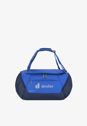 Blaue Sporttasche mit marineblauen Akzenten, aus robustem Stoff gefertigt. Verfügt über zwei Reißverschlüsse, Tragegriffe und ein Logo an der Seite.