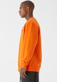 9N1M SENSE ESSENTIAL - Felpa - orange