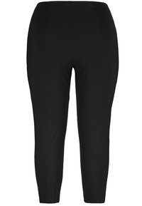 Schwarze, enganliegende Leggings mit glatter Textur und knöchellangem Design, aus elastischem Stoff für Komfort und Flexibilität.