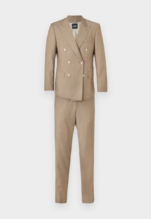Beige, double-breasted suit with a tailored fit, featuring two front pockets and six buttons, made from smooth fabric. Pants included.