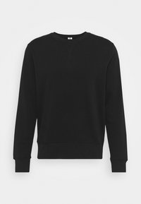 Schwarzes Sweatshirt mit langen Ärmeln, gerippten Bündchen und rundem Halsausschnitt. Hergestellt aus weichem Material mit einem schlichten, einfarbigen Design.