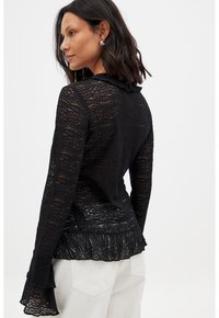 NA-KD SLEEVE FLOUNCE - Blouse - black